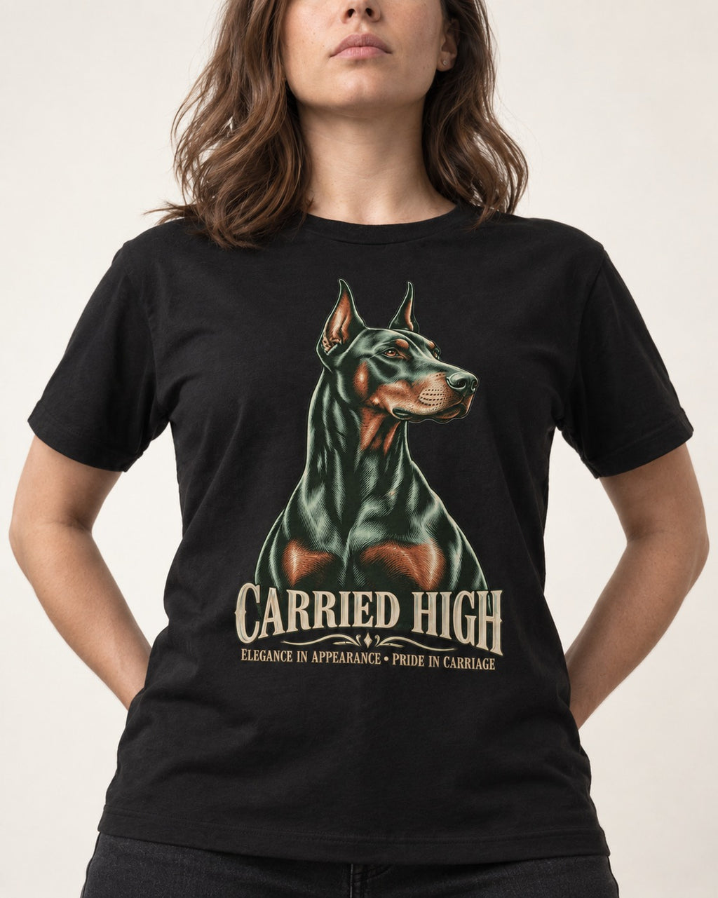 Doberman Carried High Portrait Graphic T-Shirt in Black, worn by a model, front view