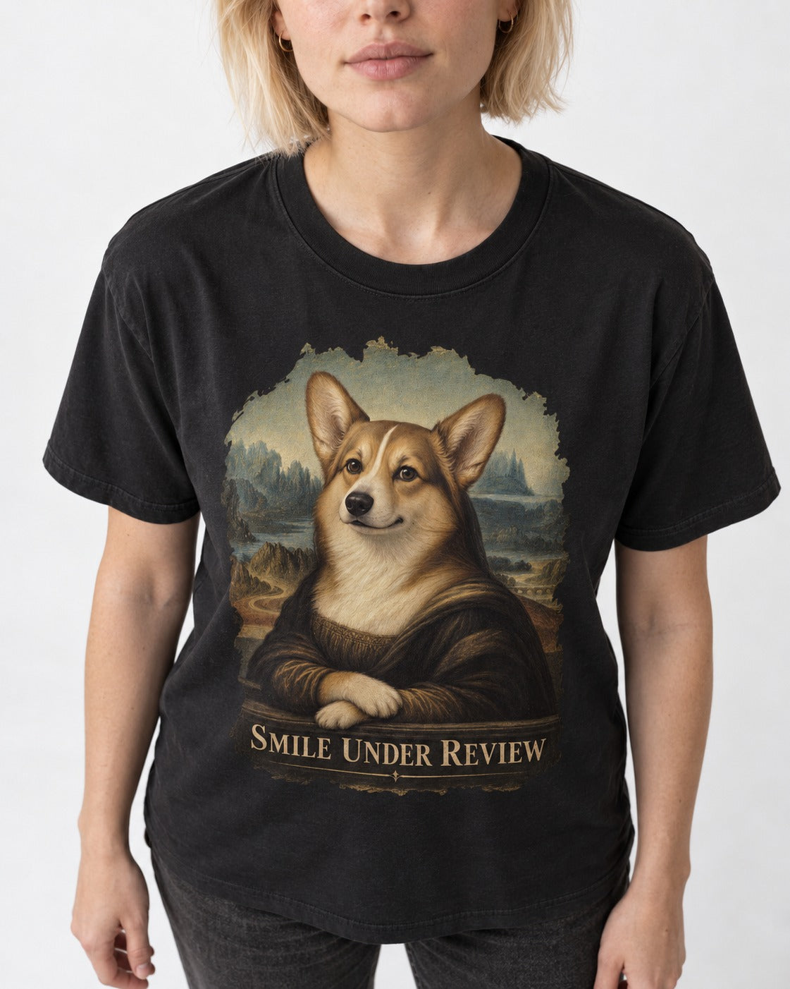 Corgi Smile Under Review Mona Lisa Portrait T-Shirt in Black, worn by a model, front view