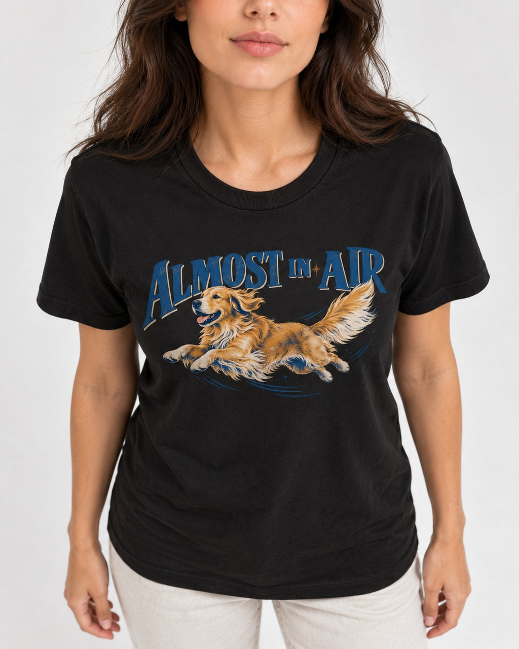 Golden Retriever Almost in Air Flying Graphic T-Shirt in Black, worn by a model, front view