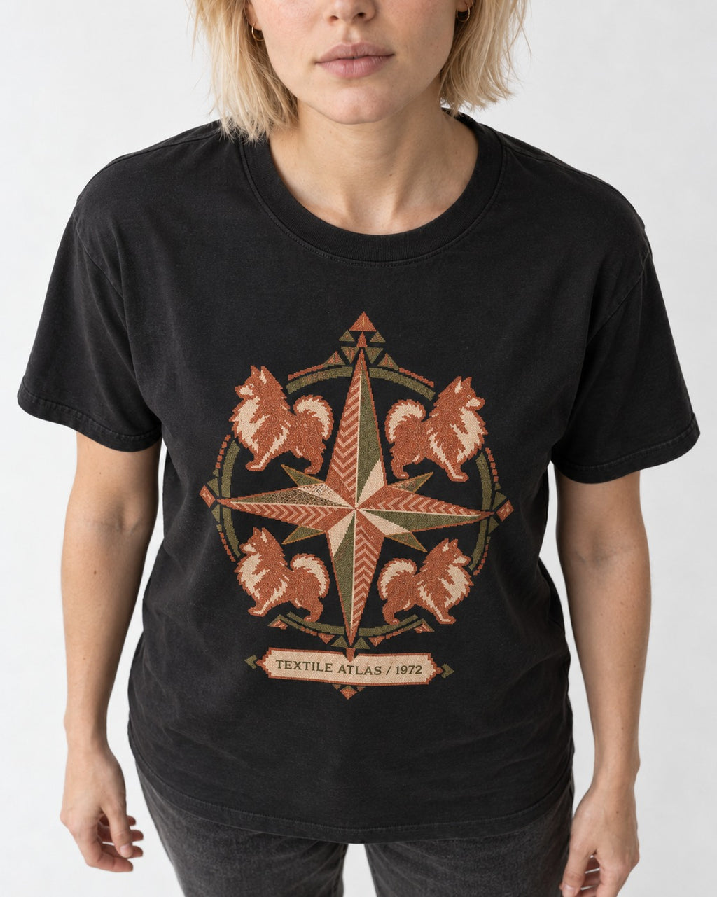 Pomeranian Textile Atlas Compass Rose Graphic T-Shirt in Black, worn by a model, front view