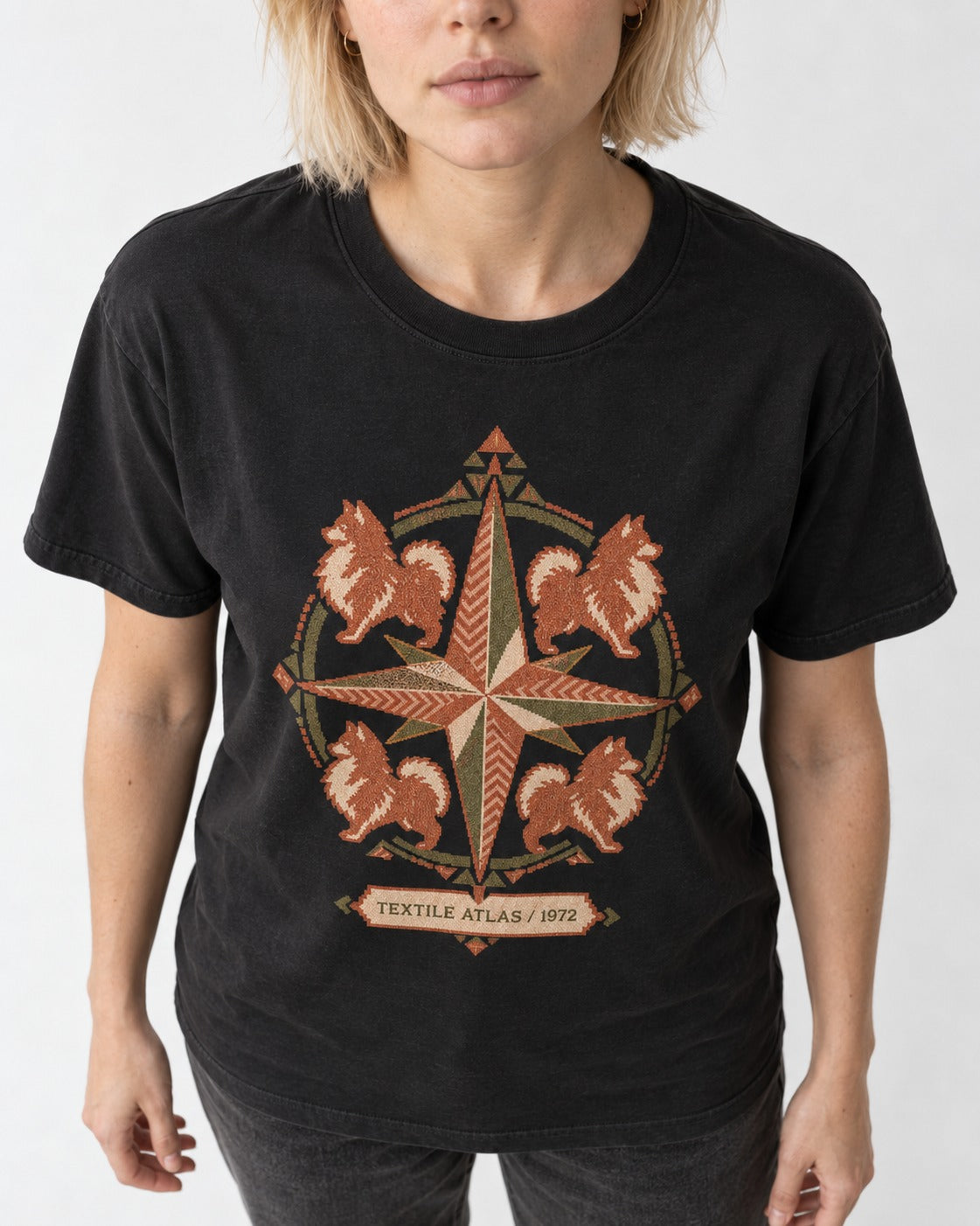 Pomeranian Textile Atlas Compass Rose Graphic T-Shirt in Black, worn by a model, front view