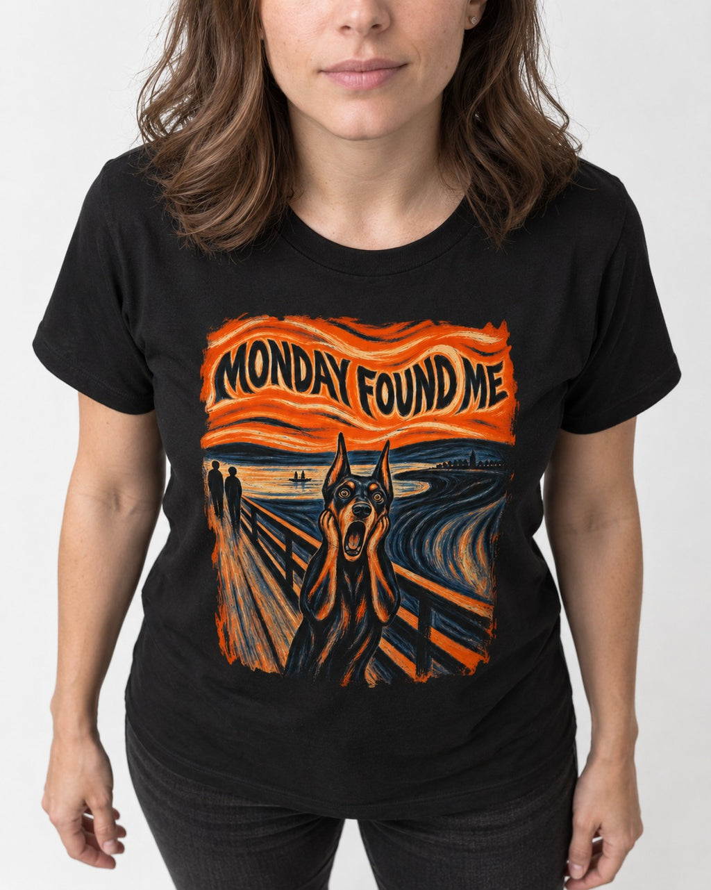 Doberman Monday Found Me Scream Graphic T-Shirt in Black, worn by a model, front view