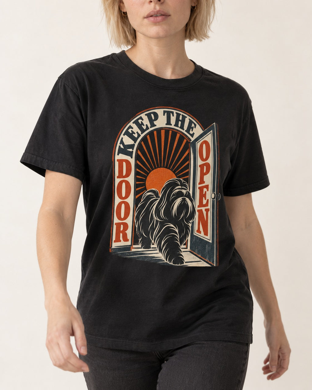 Shih Tzu Keep the Door Open Retro Doorway Graphic T-Shirt in Black, worn by a model, front view
