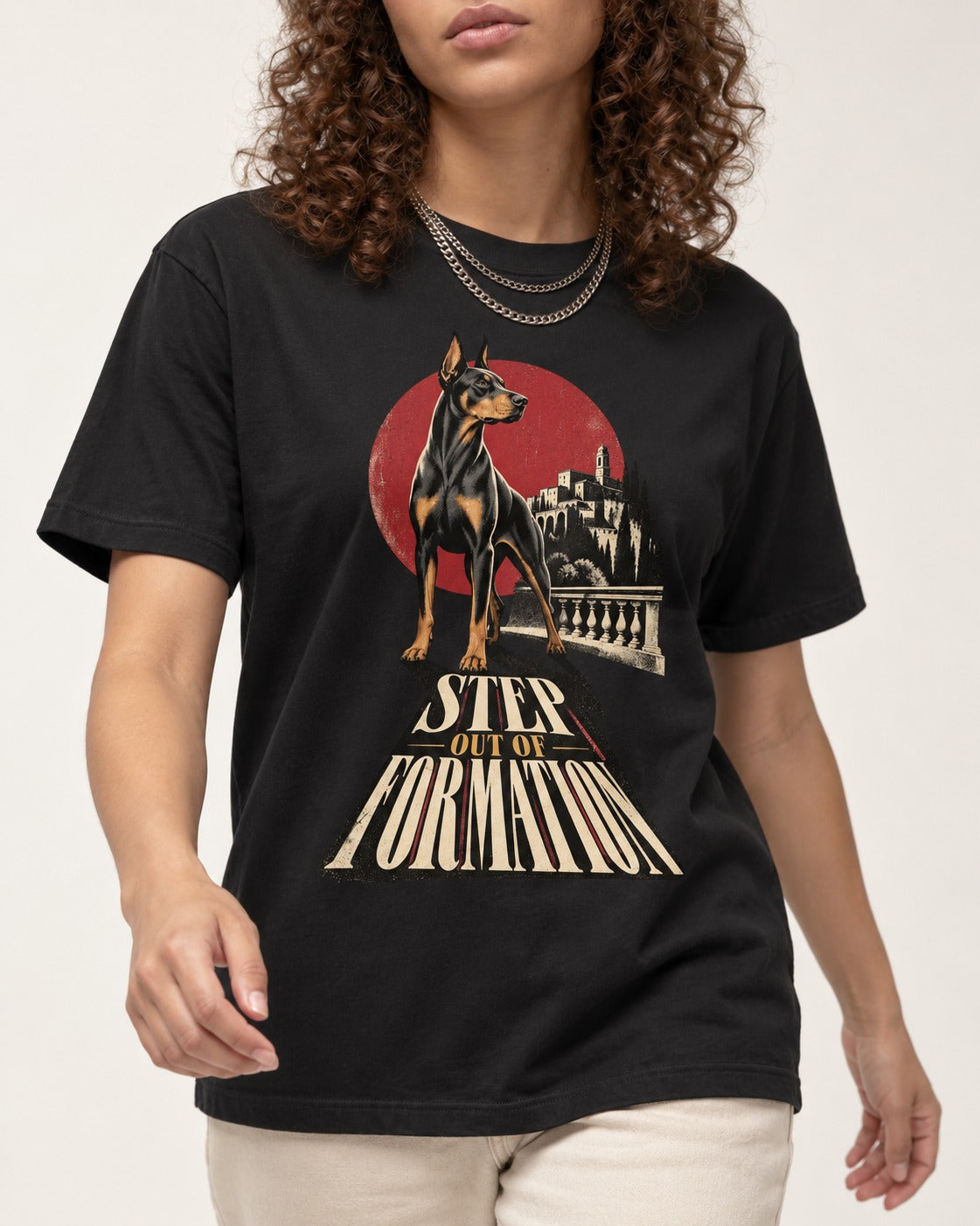 Doberman Step Out of Formation Road Vista Graphic T-Shirt in Black, worn by a model, front view