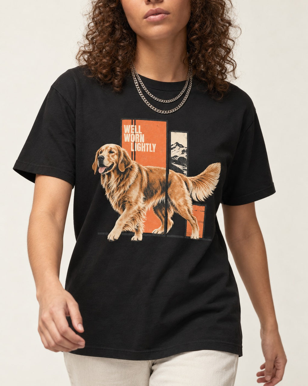 Golden Retriever Well Worn Lightly Mountain Graphic T-Shirt in Black, worn by a model, front view