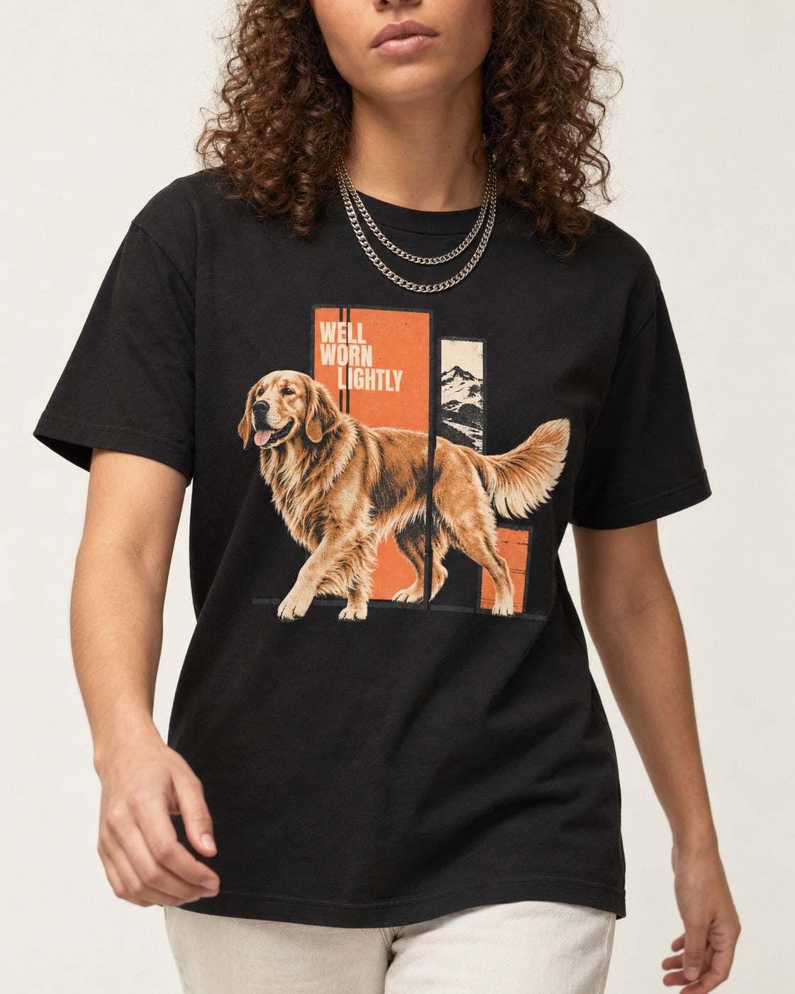 Golden Retriever Well Worn Lightly Mountain Graphic T-Shirt in Black, worn by a model, front view