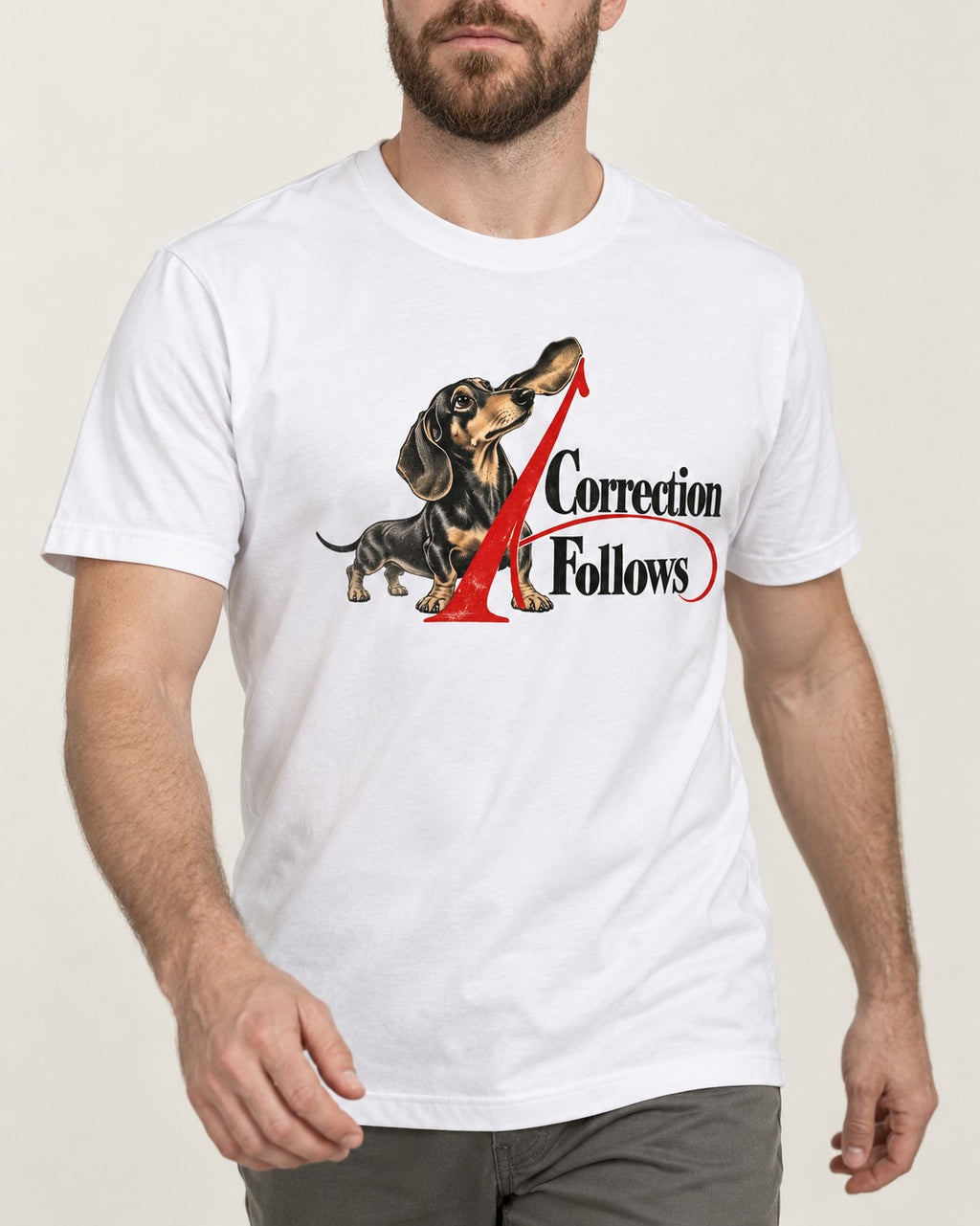 A Dachshund Correction Follows T-Shirt in White, worn by a model, front view