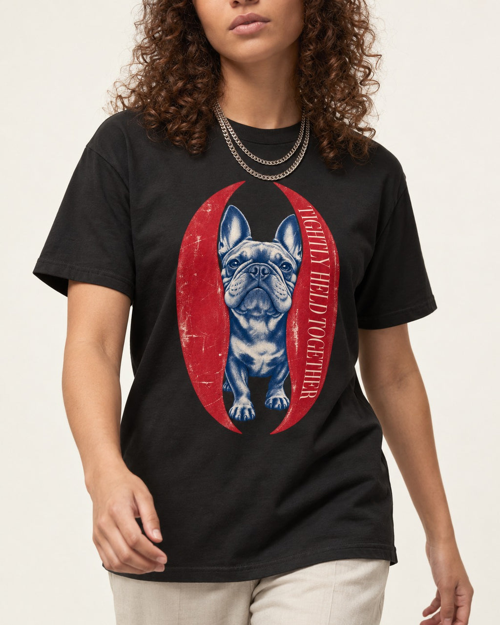 Frenchie Tightly Held Together Red Oval Graphic T-Shirt in Black, worn by a model, front view