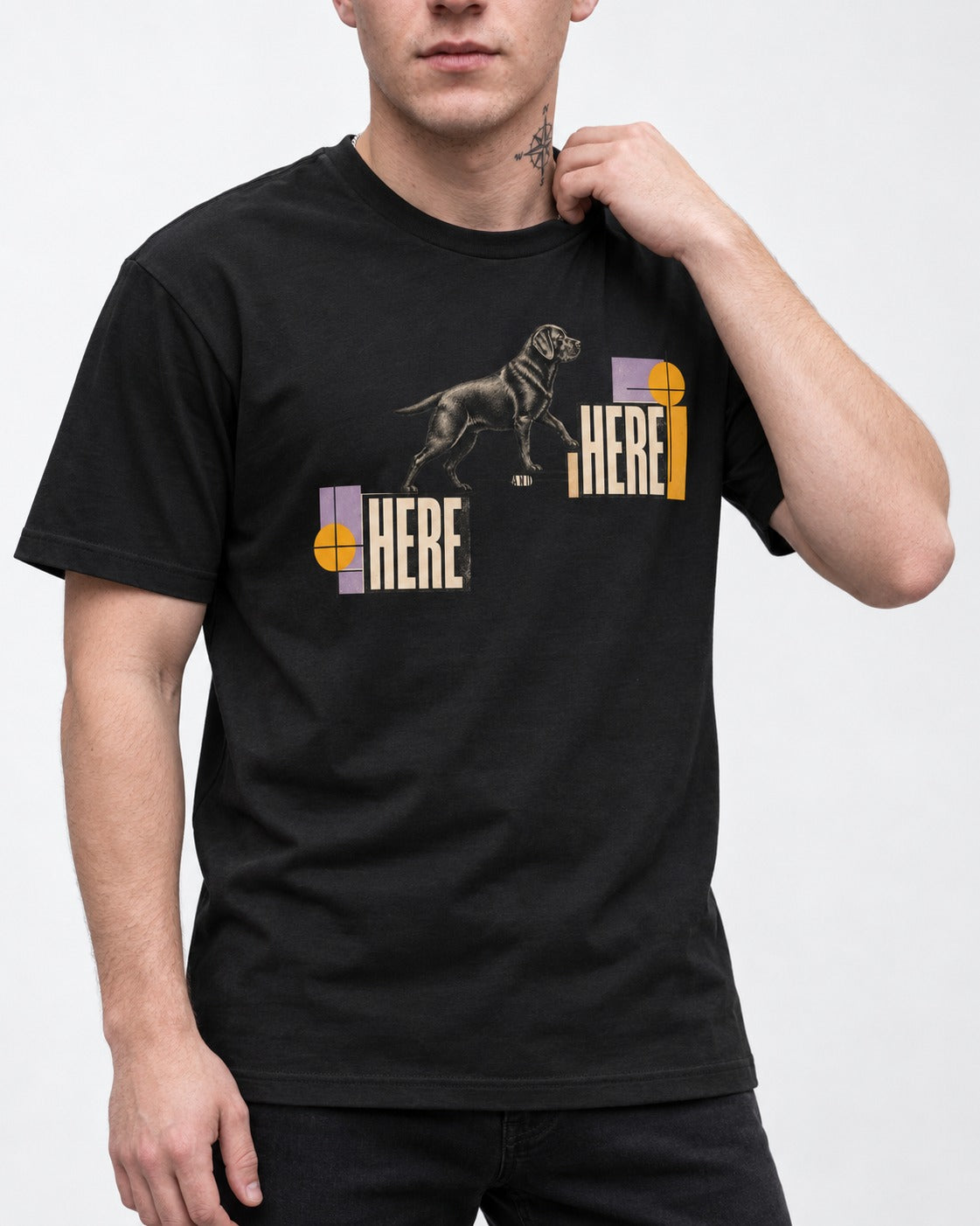 Here and Here Stepping Labrador Retriever Graphic T-Shirt in Black, worn by a model, front view