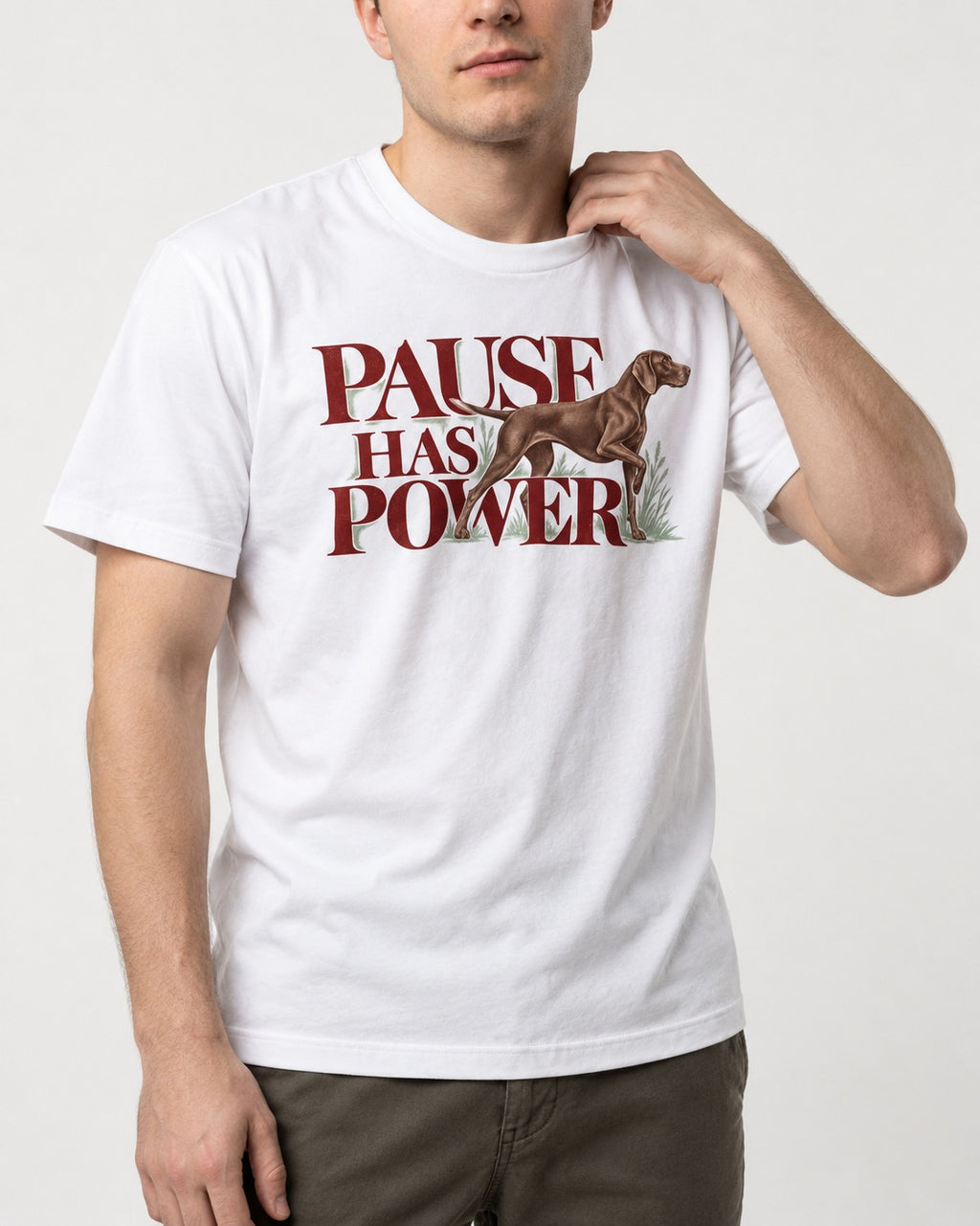 Pause Has Power German Shorthaired Pointer T-Shirt in White, worn by a model, front view