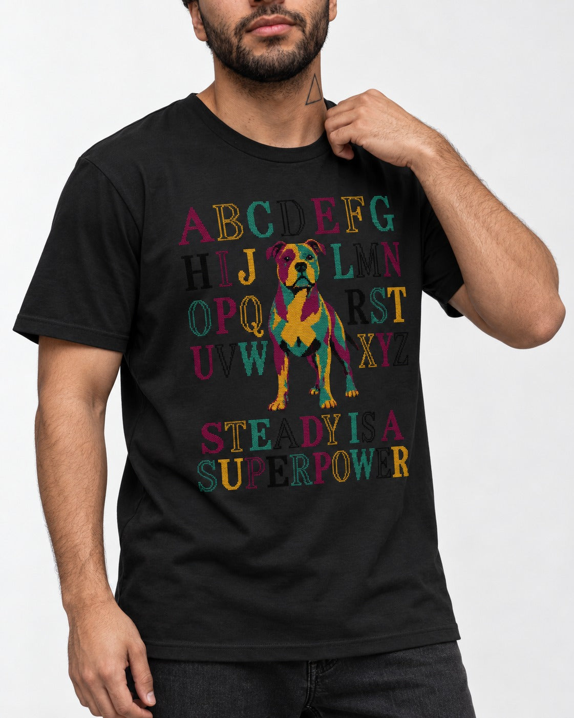 Pitbull Steady Is a Superpower Alphabet Graphic T-Shirt in Black, worn by a model, front view