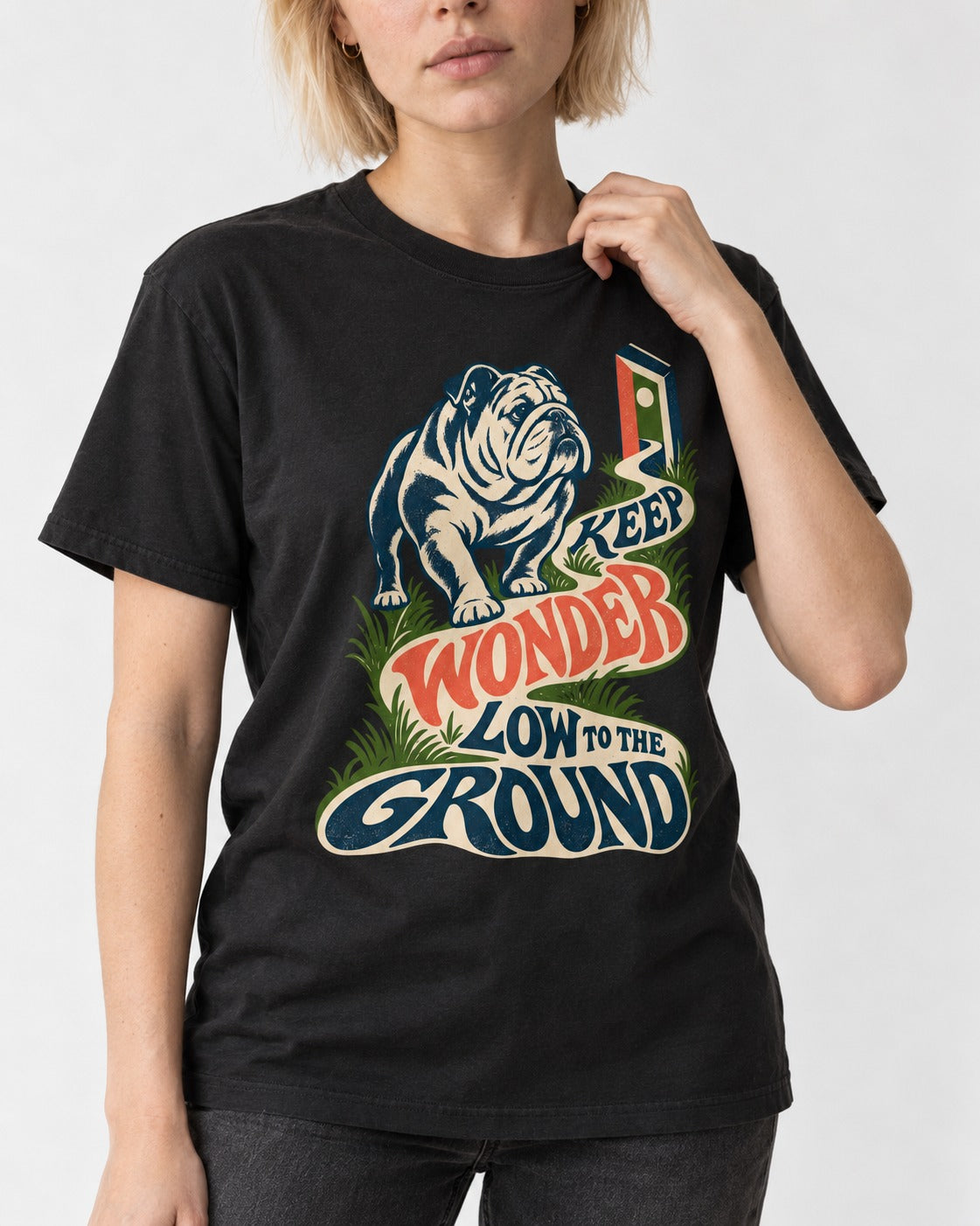 Keep Wonder Low to the Ground English Bulldog Graphic T-Shirt in Black, worn by a model, front view