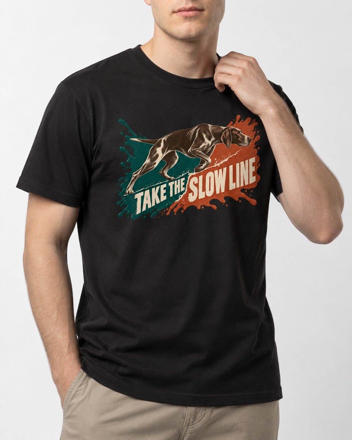 German Shorthaired Pointer Take The Slow Line Paint Splash Graphic T-Shirt in Black, worn by a model, front view