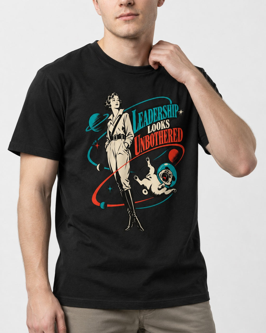 Pug Leadership Looks Unbothered Space Graphic T-Shirt in Black, worn by a model, front view