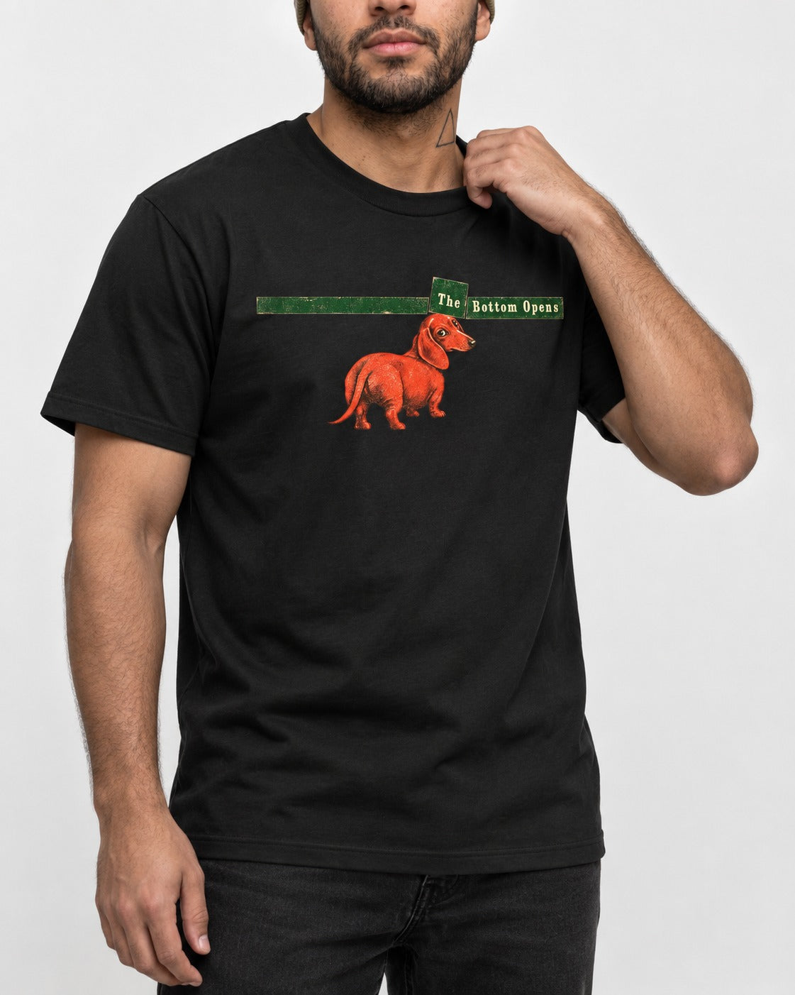 Dachshund The Bottom Opens Signpost Graphic T-Shirt in Black, worn by a model, front view