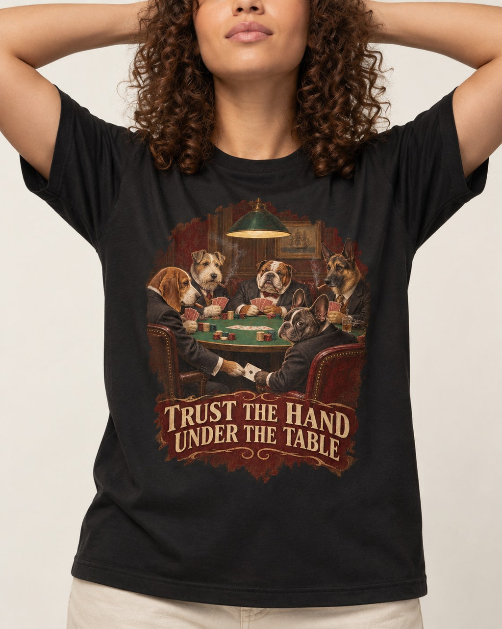 Frenchie Trust the Hand Under the Table Poker Dogs Graphic T-Shirt in Black, worn by a model, front view