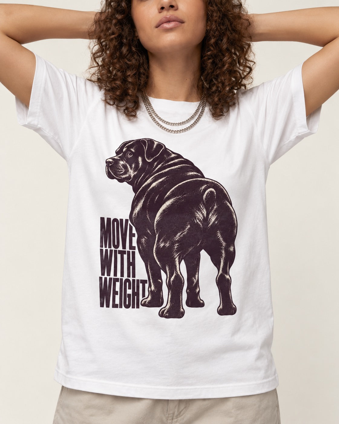 Rottweiler Moves with Weight T-Shirt in White, worn by a model, front view