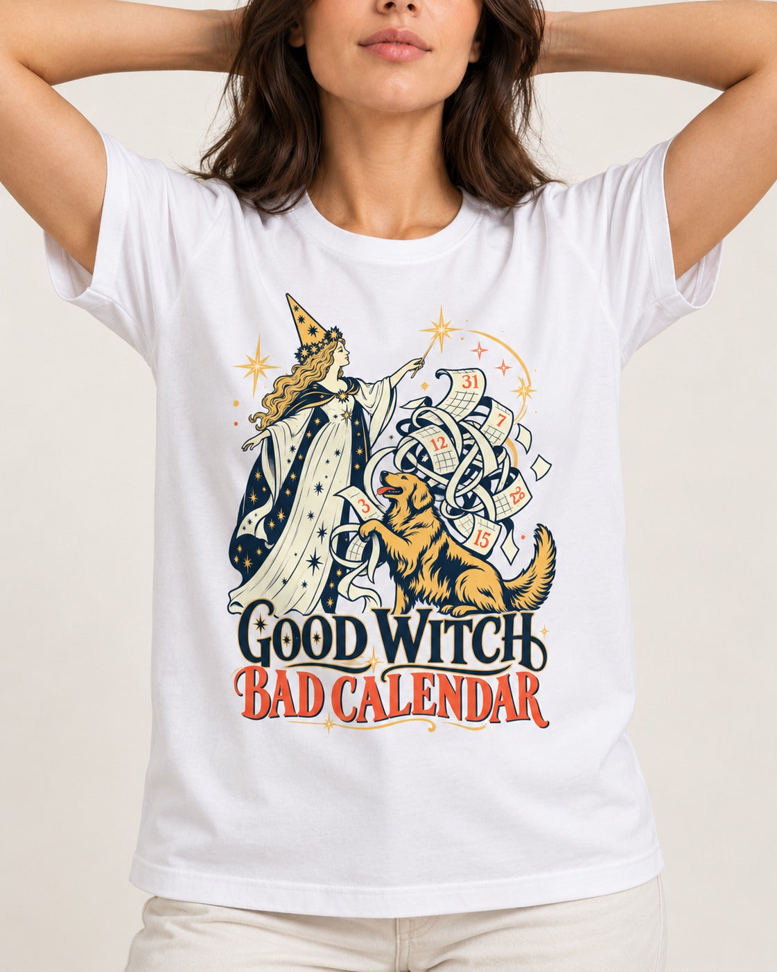 Good Witch Bad Calendar Golden Retriever T-Shirt in White, worn by a model, front view