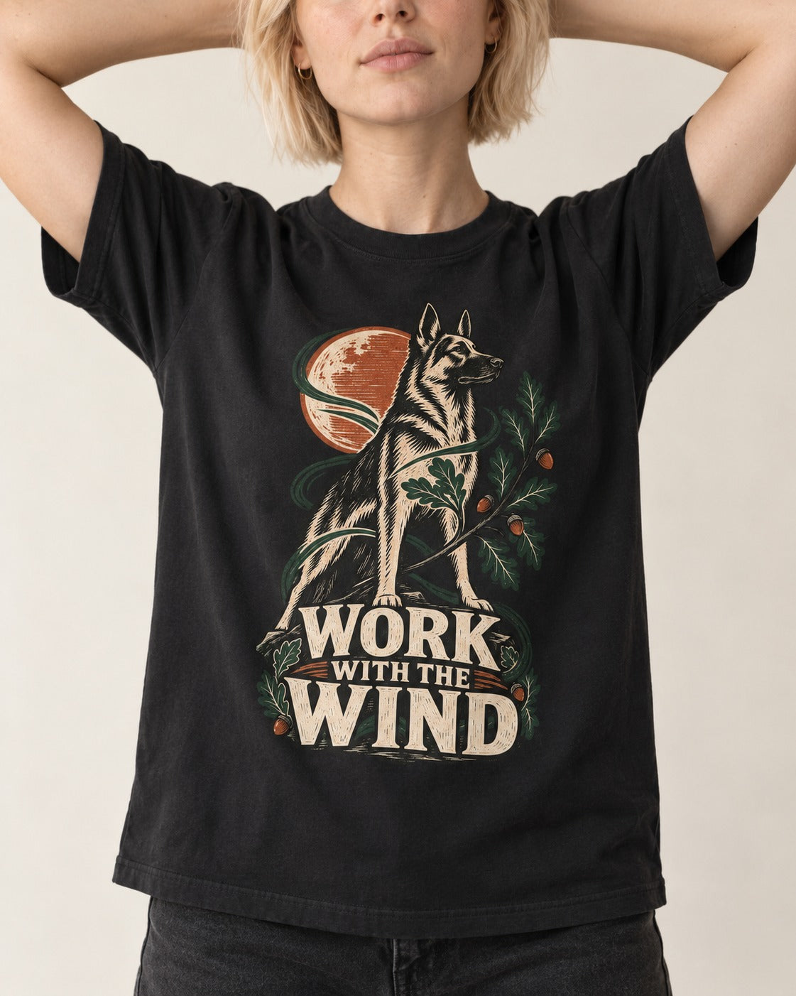 Work With The Wind Botanical Woodcut German Shepherd Dog Graphic T-Shirt in Black, worn by a model, front view
