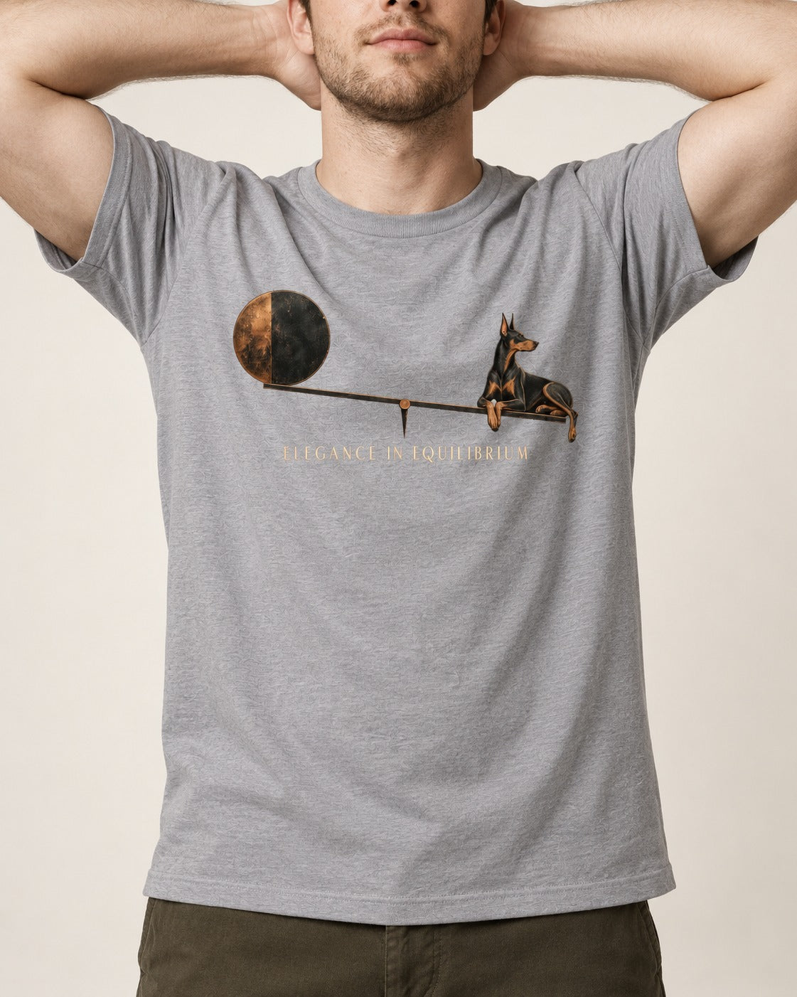 Doberman Elegance in Equilibrium Balance Graphic T-Shirt in Sport Grey, worn by a model, front view