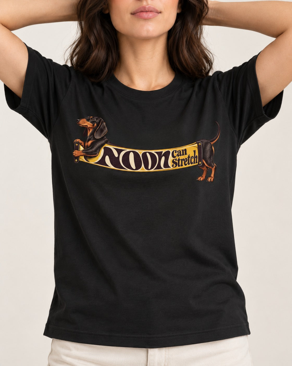 Dachshund Noon Can Stretch Sign Graphic T-Shirt in Black, worn by a model, front view