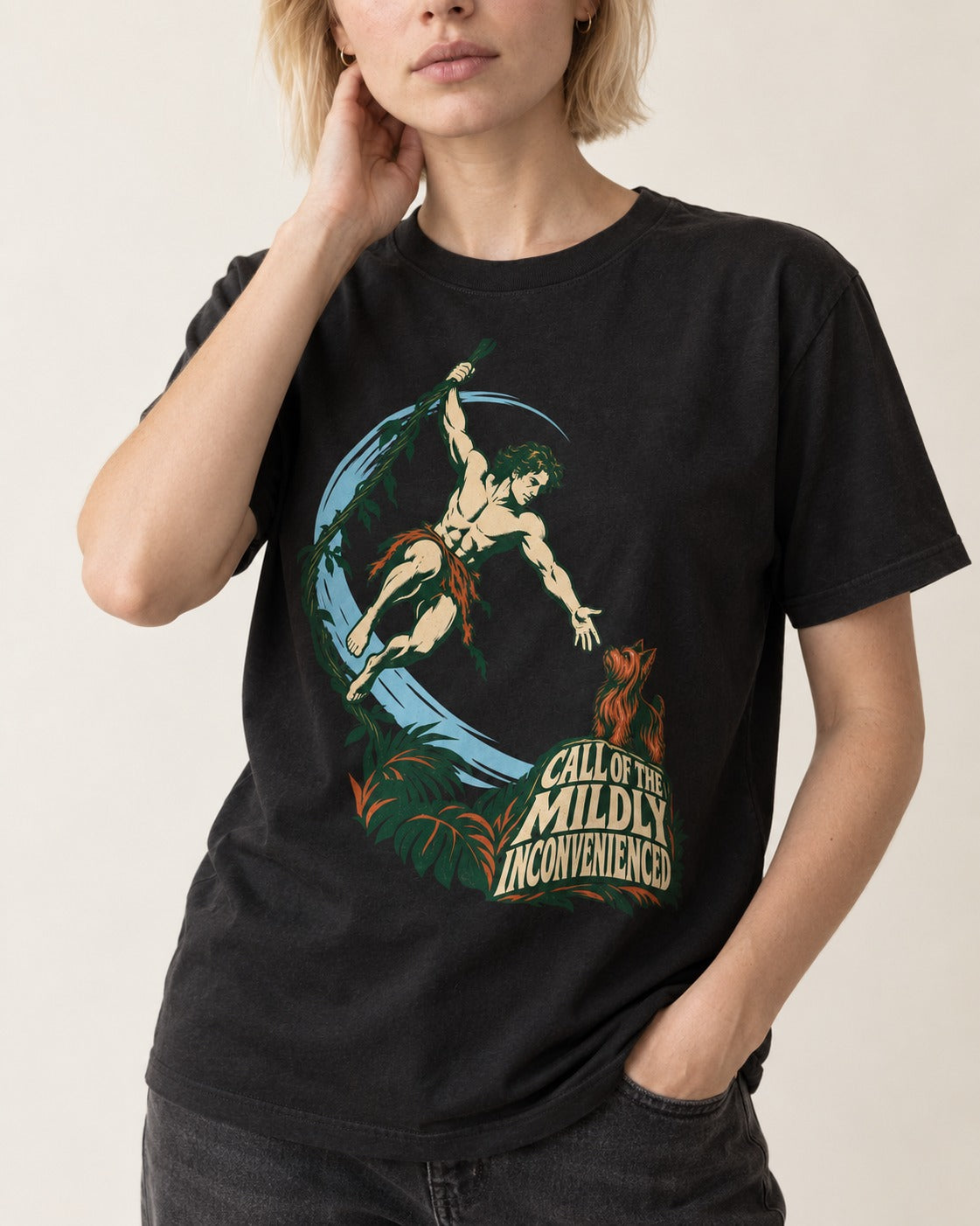 Yorkshire Terrier Call of the Mildly Inconvenienced Vine Swing Graphic T-Shirt in Black, worn by a model, front view