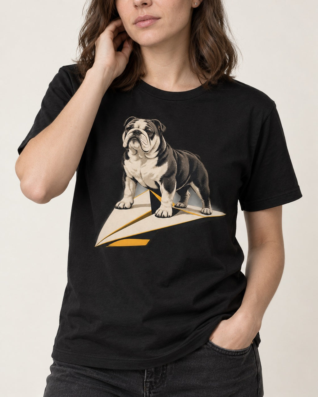 English Bulldog Paper Airplane Graphic T-Shirt in Black, worn by a model, front view