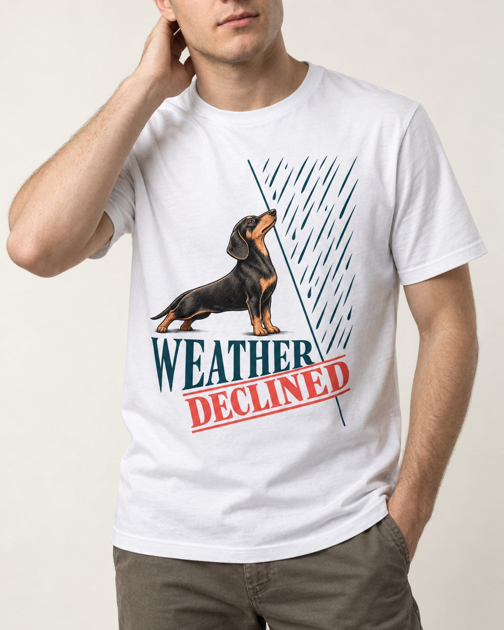 Weather Declined by Dachshund T-Shirt in White, worn by a model, front view
