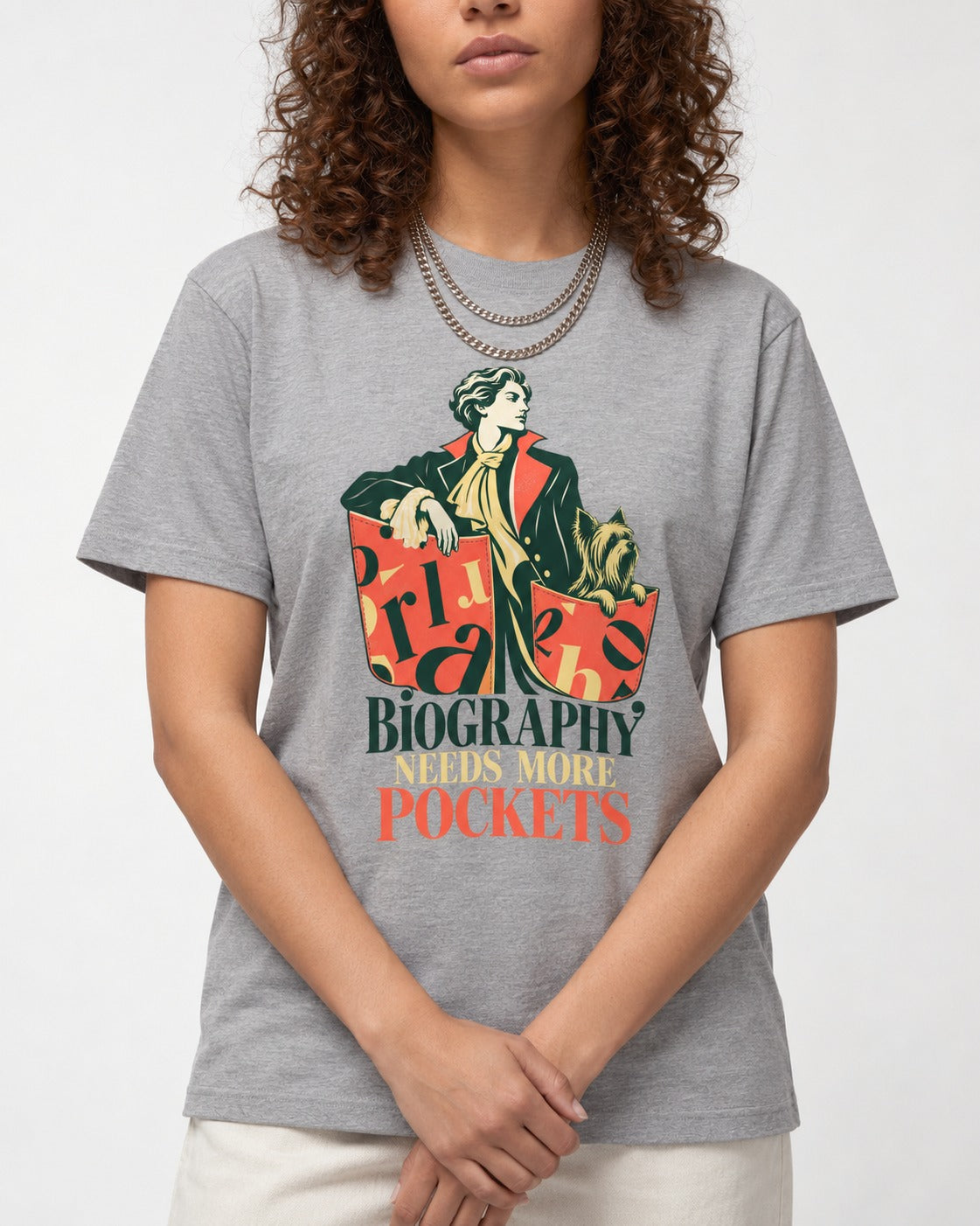 Yorkshire Terrier Biography Needs More Pockets Literary Portrait Graphic T-Shirt in Sport Grey, worn by a model, front view