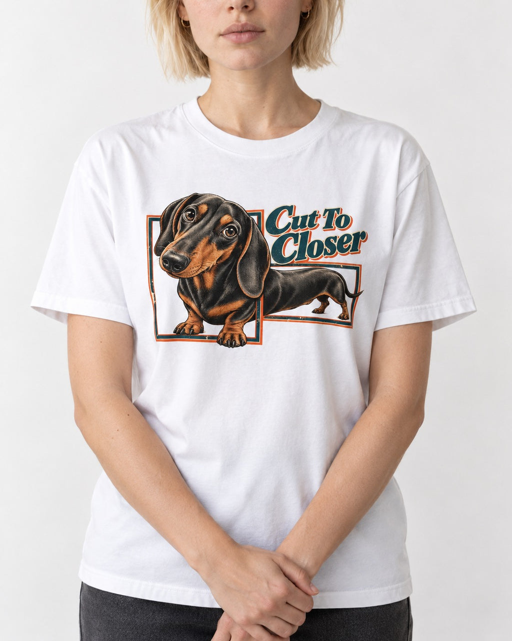 Dachshund Cut to Closer T-Shirt in White, worn by a model, front view
