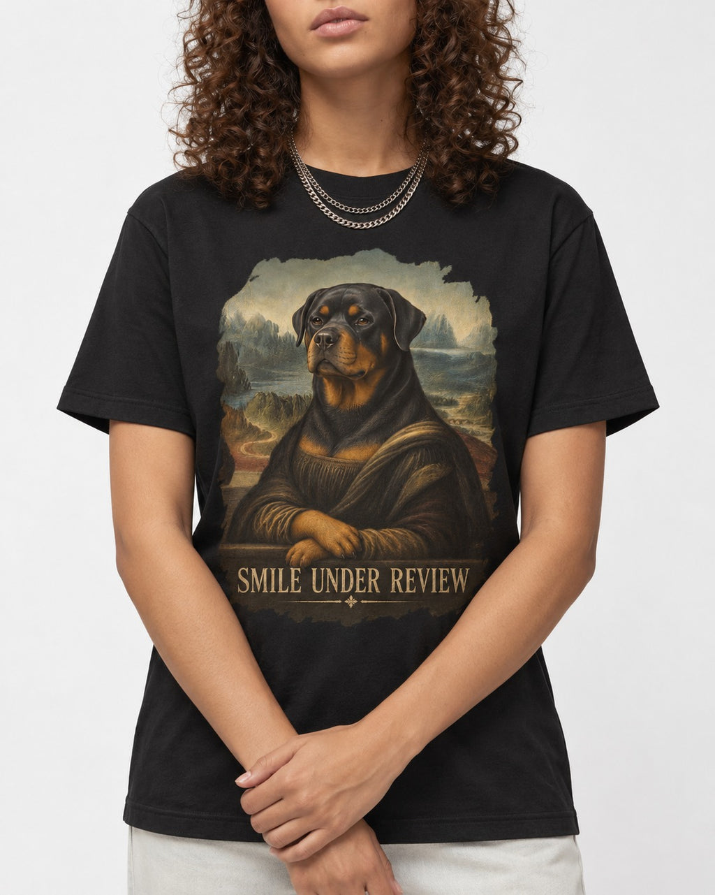 Rottweiler Smile Under Review Renaissance Portrait Graphic T-Shirt in Black, worn by a model, front view