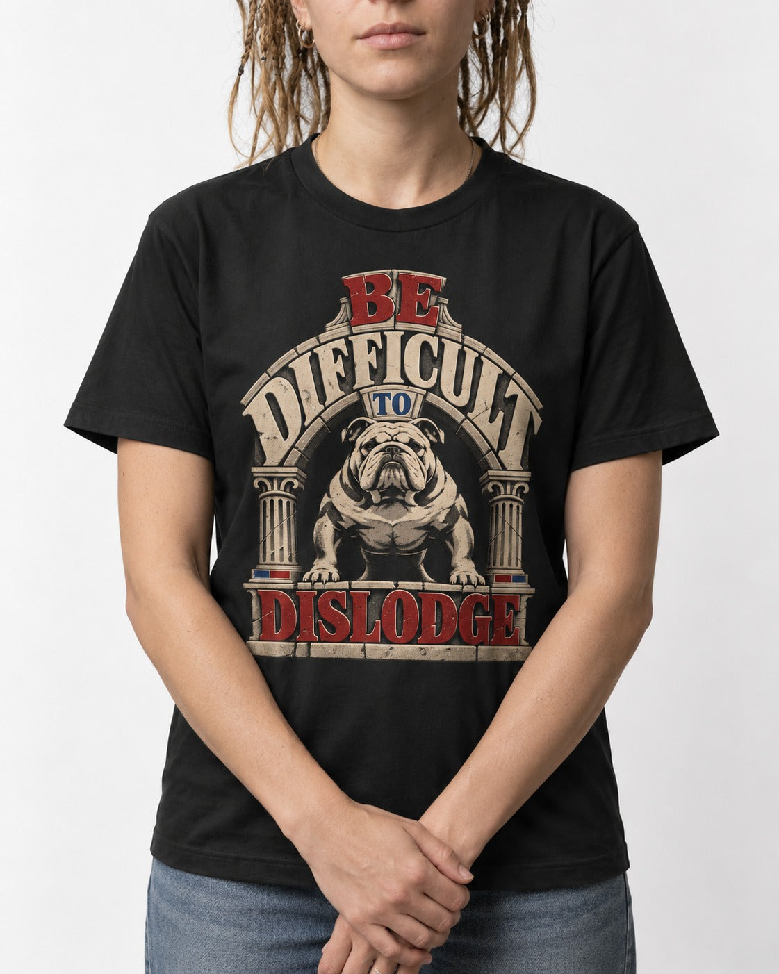 English Bulldog Be Difficult to Dislodge Stone Arch Graphic T-Shirt in Black, worn by a model, front view