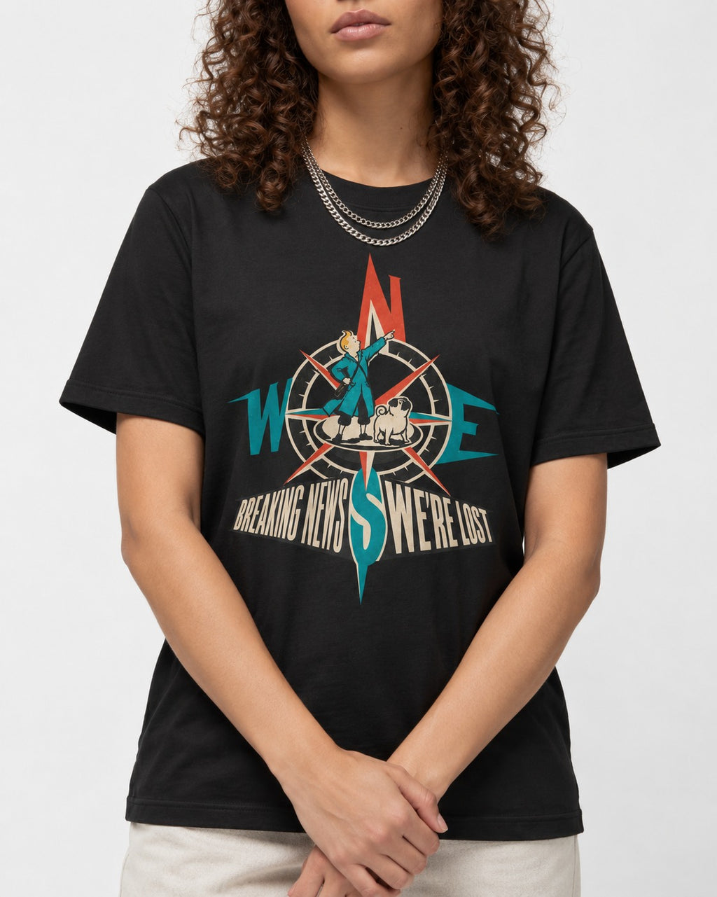 Pug Breaking News We're Lost Compass Graphic T-Shirt in Black, worn by a model, front view