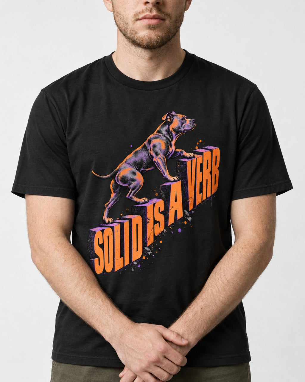 Pitbull Solid Is a Verb Step Type Graphic T-Shirt in Black, worn by a model, front view