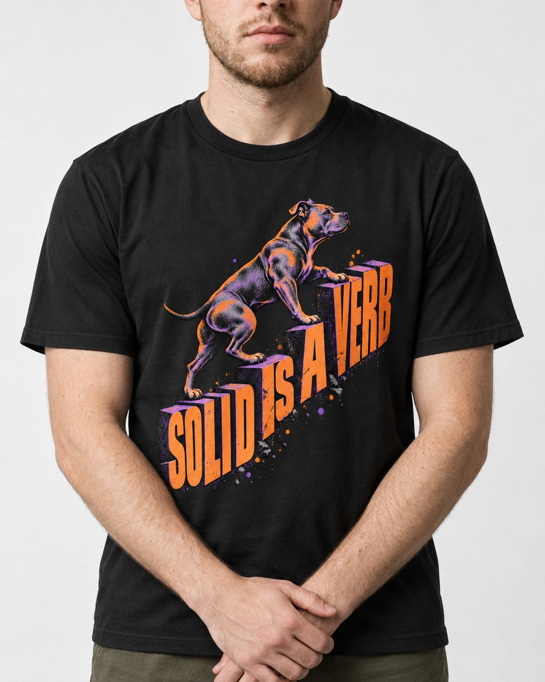 Pitbull Solid Is a Verb Step Type Graphic T-Shirt in Black, worn by a model, front view