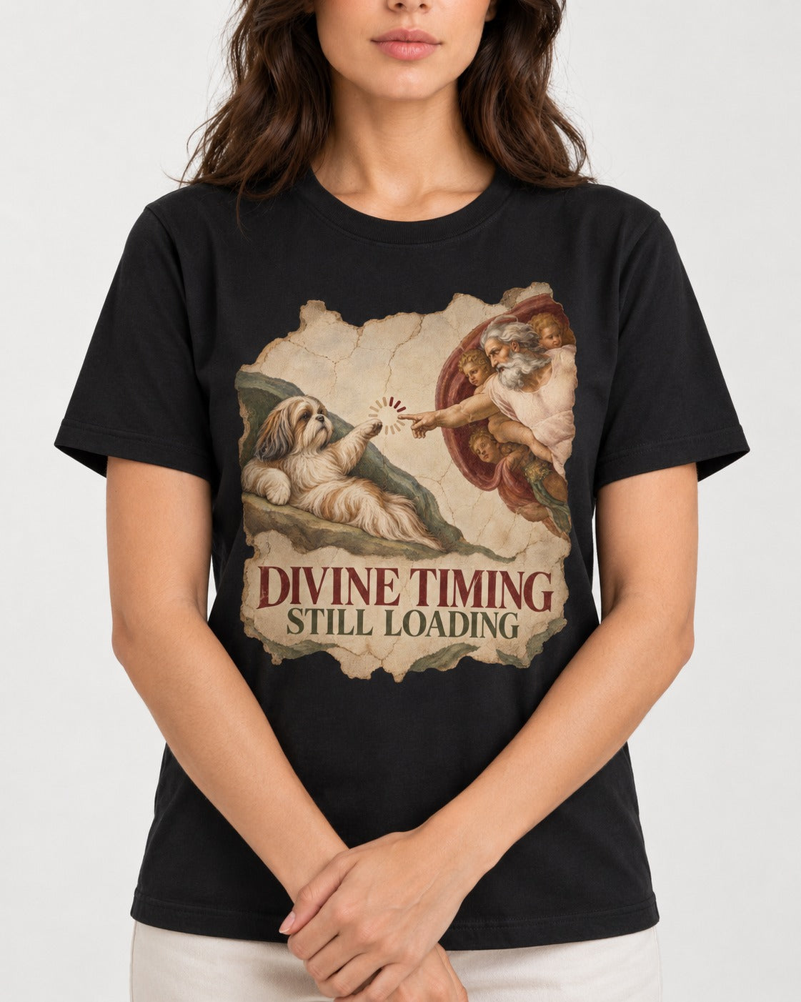 Shih Tzu Divine Timing Still Loading Renaissance Parody Graphic T-Shirt in Black, worn by a model, front view