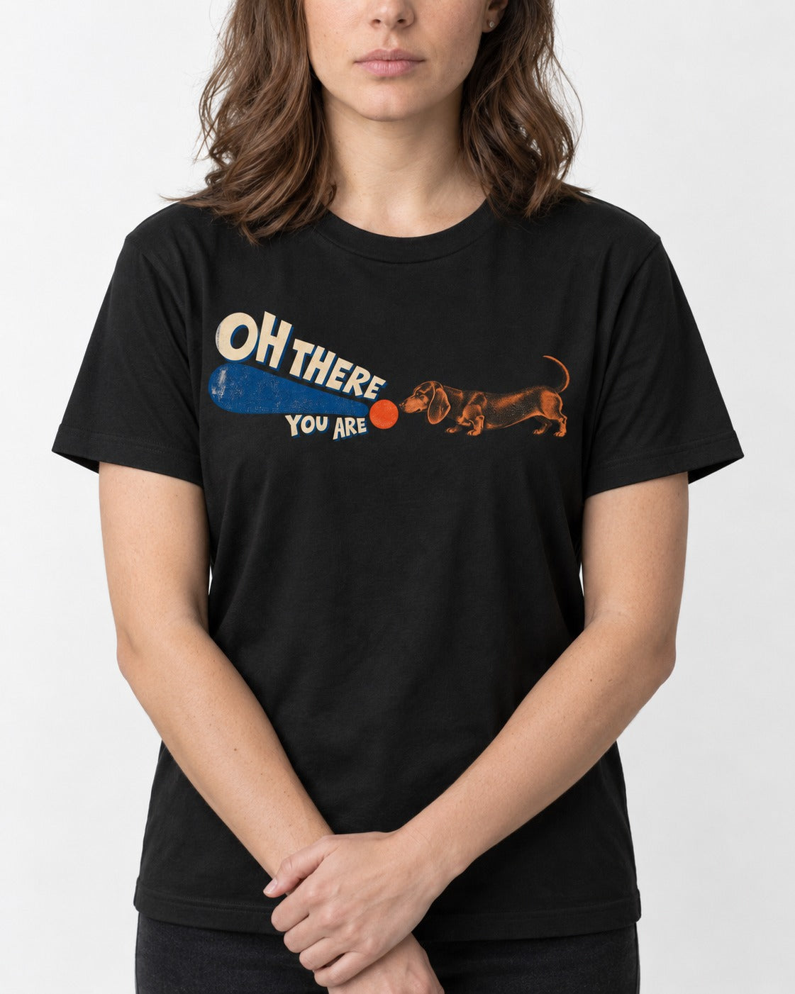 Dachshund Oh There You Are Ball Graphic T-Shirt in Black, worn by a model, front view