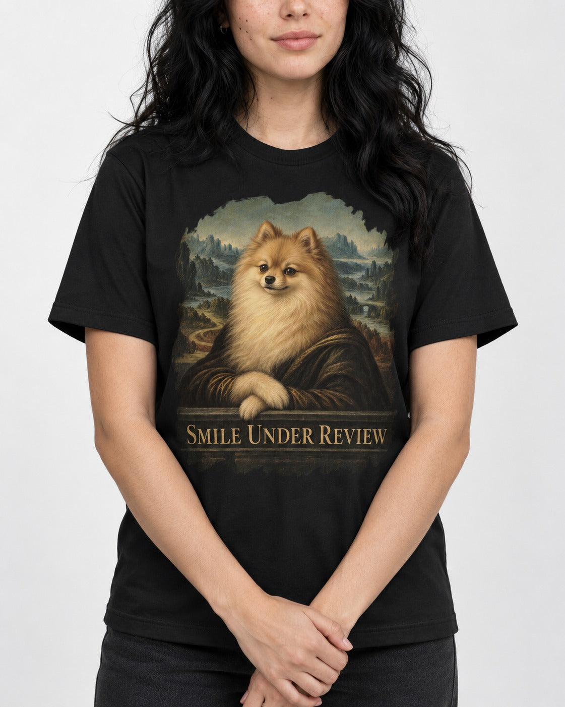Pomeranian Smile Under Review Renaissance Portrait Graphic T-Shirt in Black, worn by a model, front view