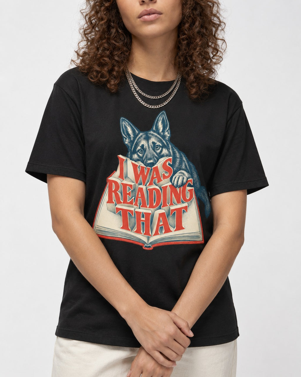 German Shepherd Dog I Was Reading That Open Book Graphic T-Shirt in Black, worn by a model, front view