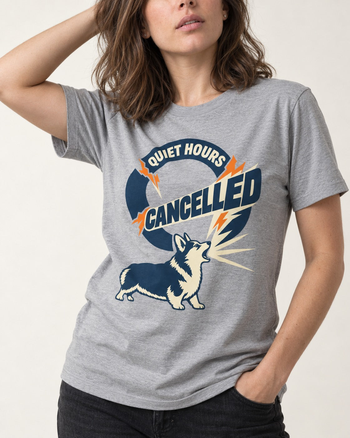 Corgi Quiet Hours Cancelled Calling Badge Graphic T-Shirt in Sport Grey, worn by a model, front view