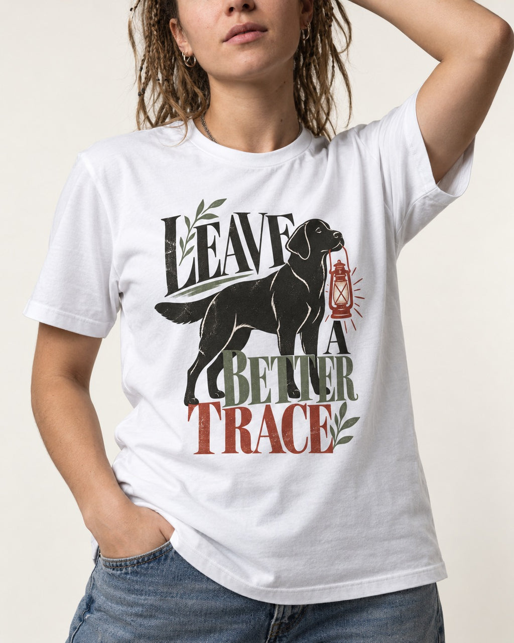 Leave a Better Trace Labrador Retriever T-Shirt in White, worn by a model, front view
