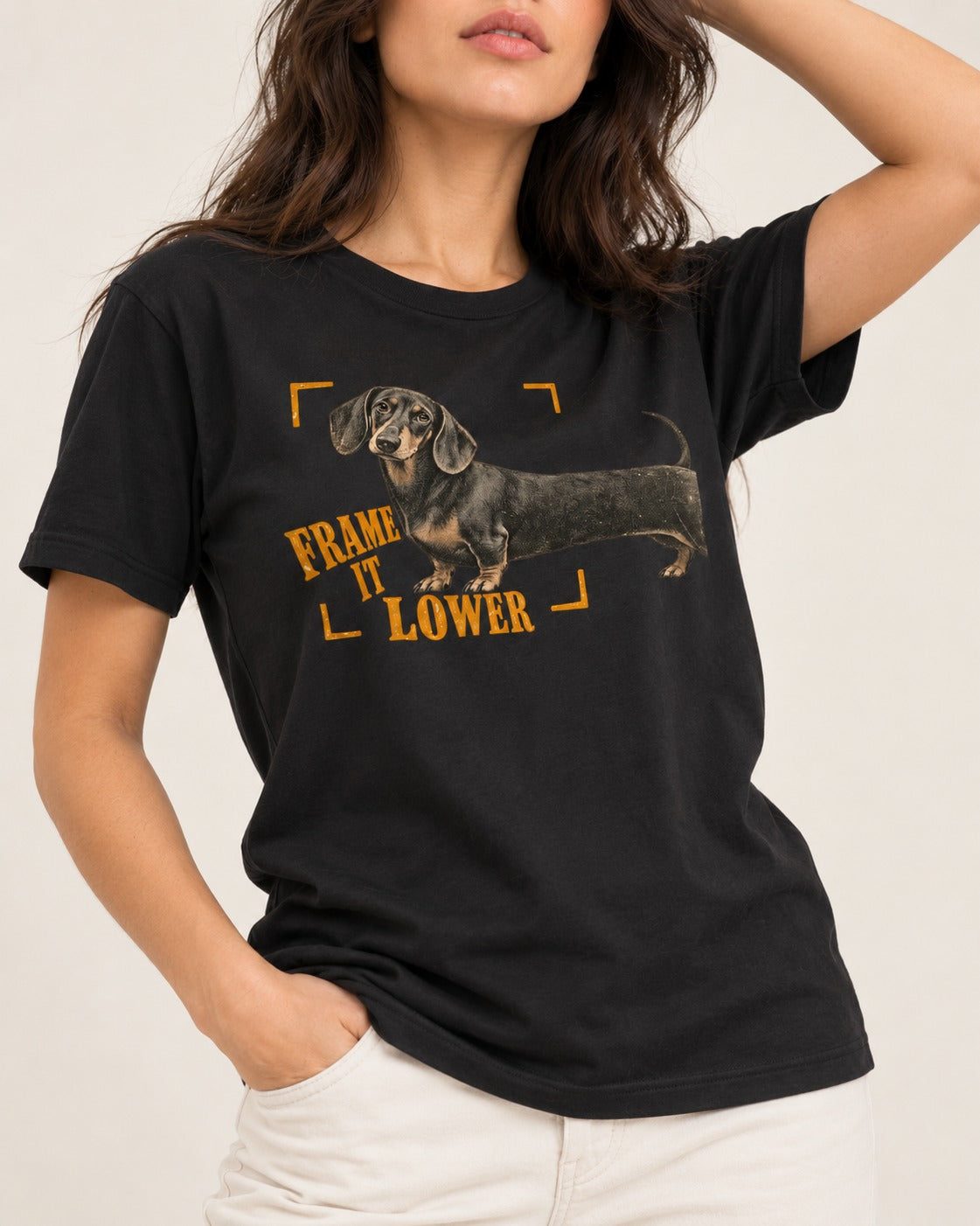 Dachshund Frame It Lower Viewfinder Graphic T-Shirt in Black, worn by a model, front view