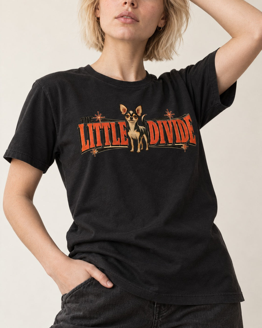 Chihuahua The Little Divide Retro Sign Graphic T-Shirt in Black, worn by a model, front view