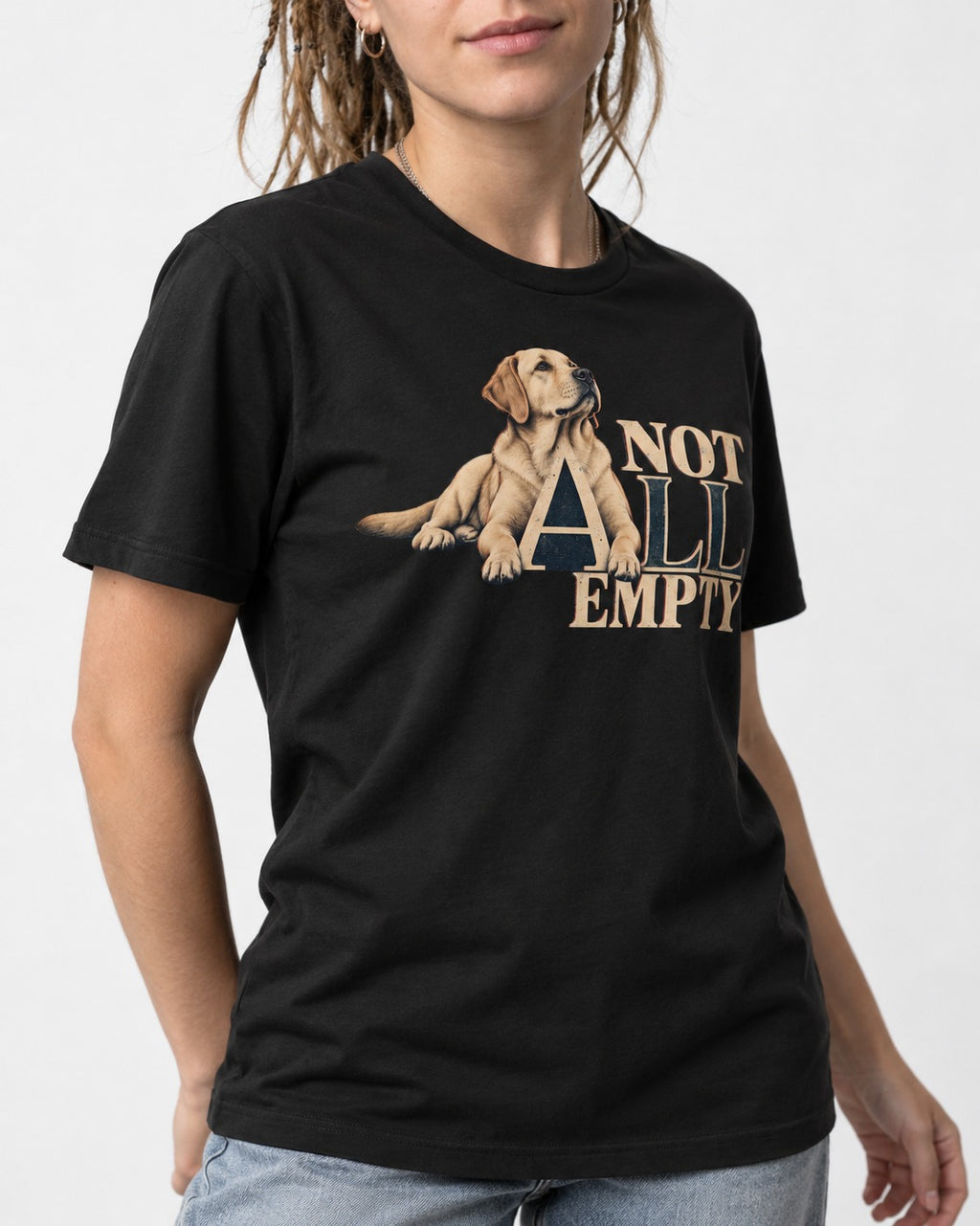 Labrador Retriever Not All Empty Lounging Typography Graphic T-Shirt in Black, worn by a model, front view
