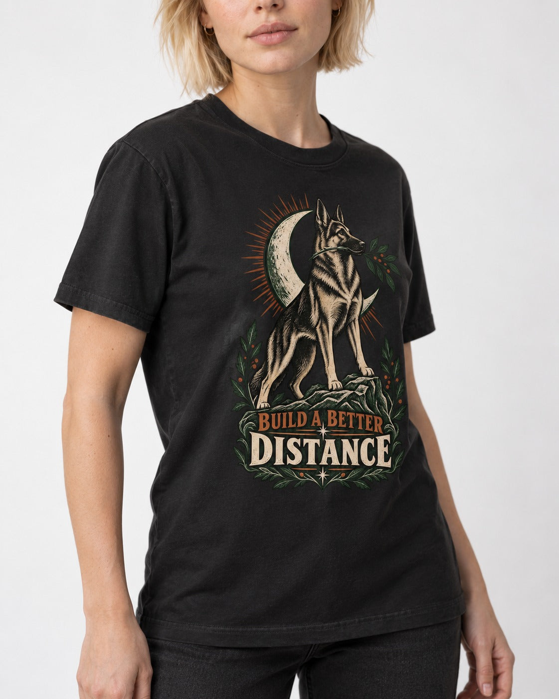 Build A Better Distance Moon Woodcut German Shepherd Dog Graphic T-Shirt in Black, worn by a model, front view