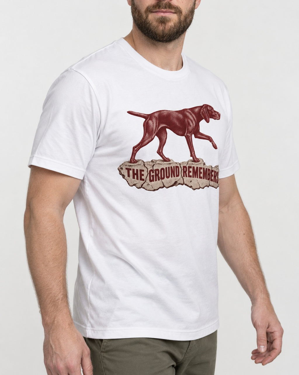 The Ground Remembers German Shorthaired Pointer T-Shirt in White, worn by a model, front view