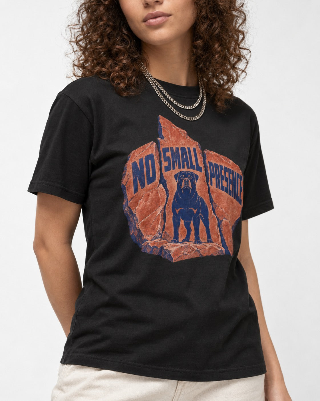 Rottweiler No Small Presence Monument Rock Graphic T-Shirt in Black, worn by a model, front view