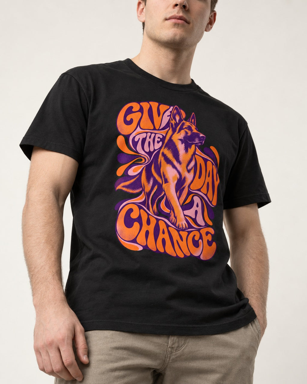 Give The Day A Chance Psychedelic German Shepherd Dog Graphic T-Shirt in Black, worn by a model, front view
