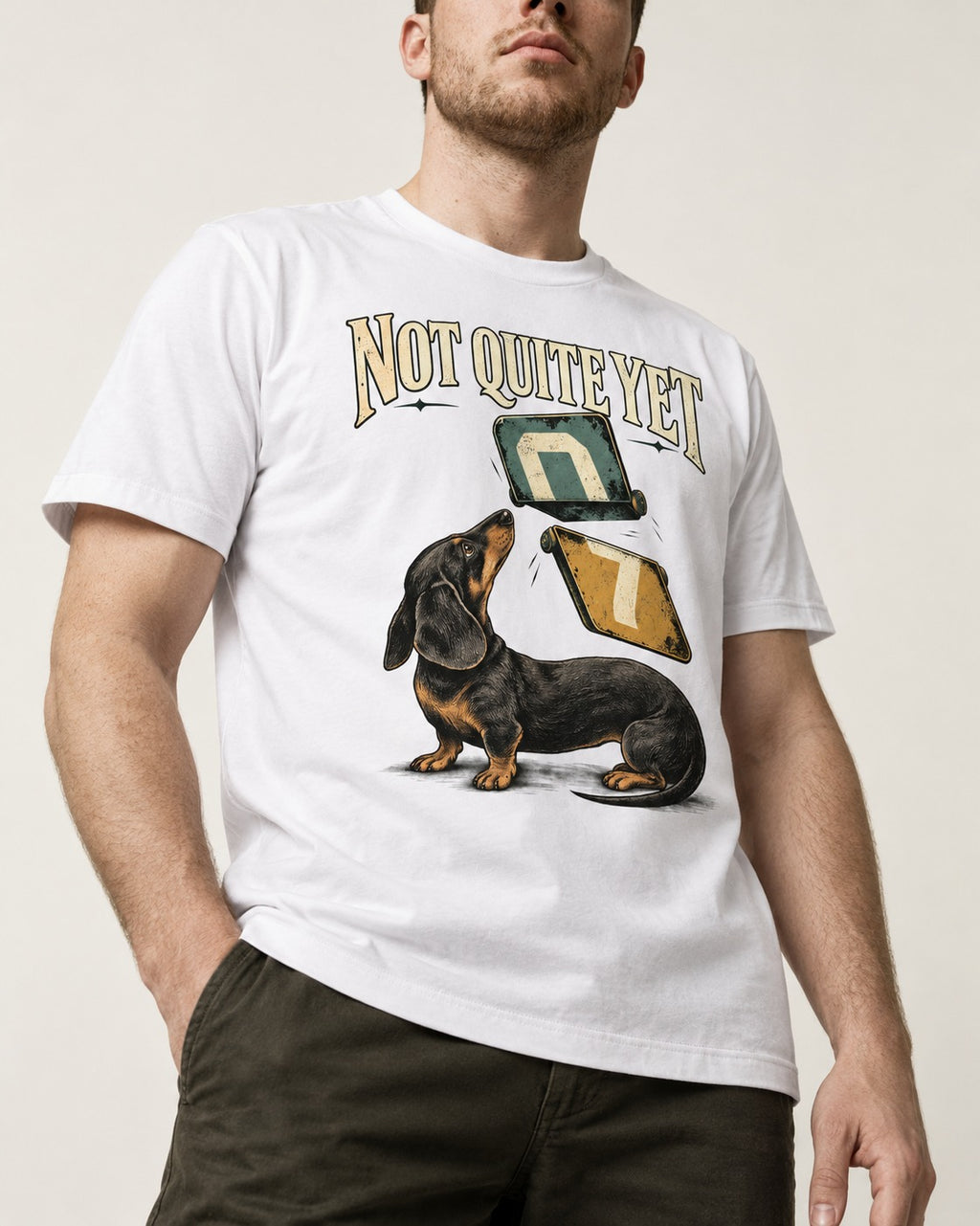 Not Quite Yet Dachshund T-Shirt in White, worn by a model, front view