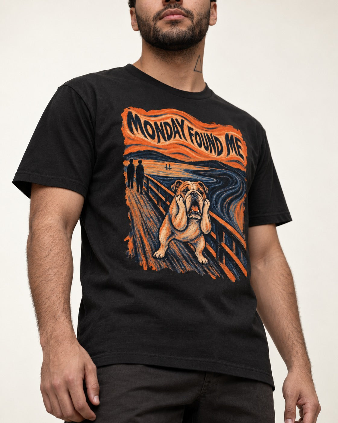 English Bulldog Monday Found Me Scream Graphic T-Shirt in Black, worn by a model, front view